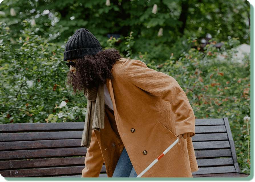Person using VISICANE white cane